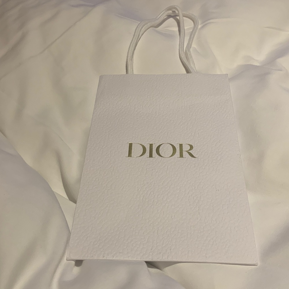 Authentic rare Dior Cream Luxury Bag paper with golden Dior letter, textured